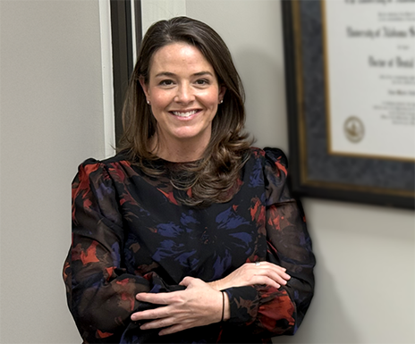 Doctor Ardovino smiling in the office hallway