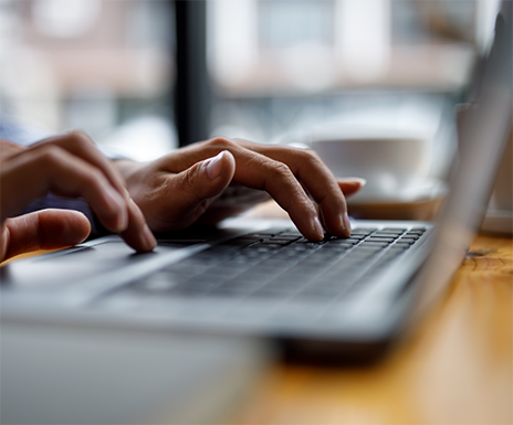 Person typing on a laptop