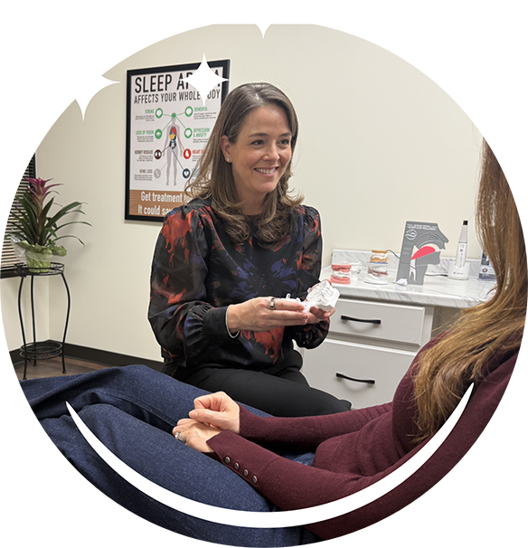 Hoover sleep dentist showing a patient a model of the teeth