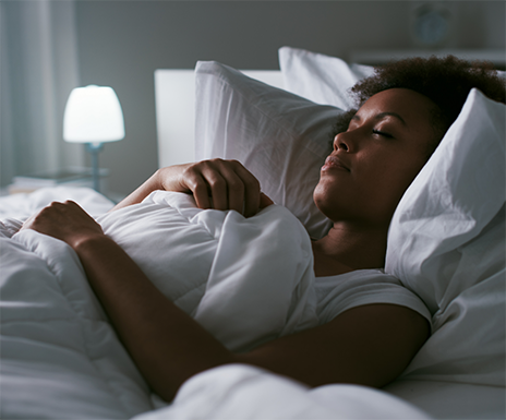 Woman sleeping on her back