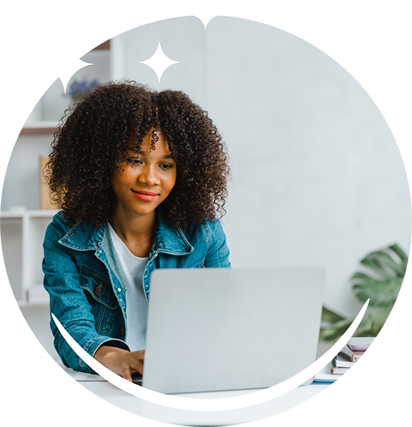 Young woman using a laptop at a table